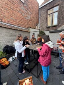 Pilot coordinators having waffles in Bruges