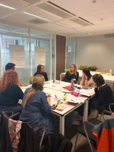 Pilot coordinators involved in a workshop activity