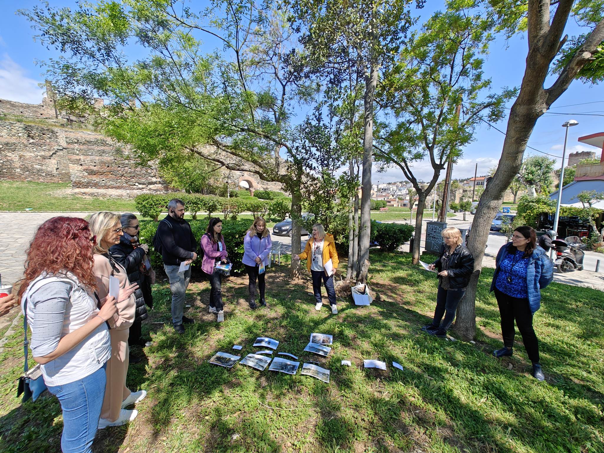 People taking part in a creative outdoor activity.